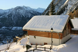 Swiss Chalet Covered In Snow
