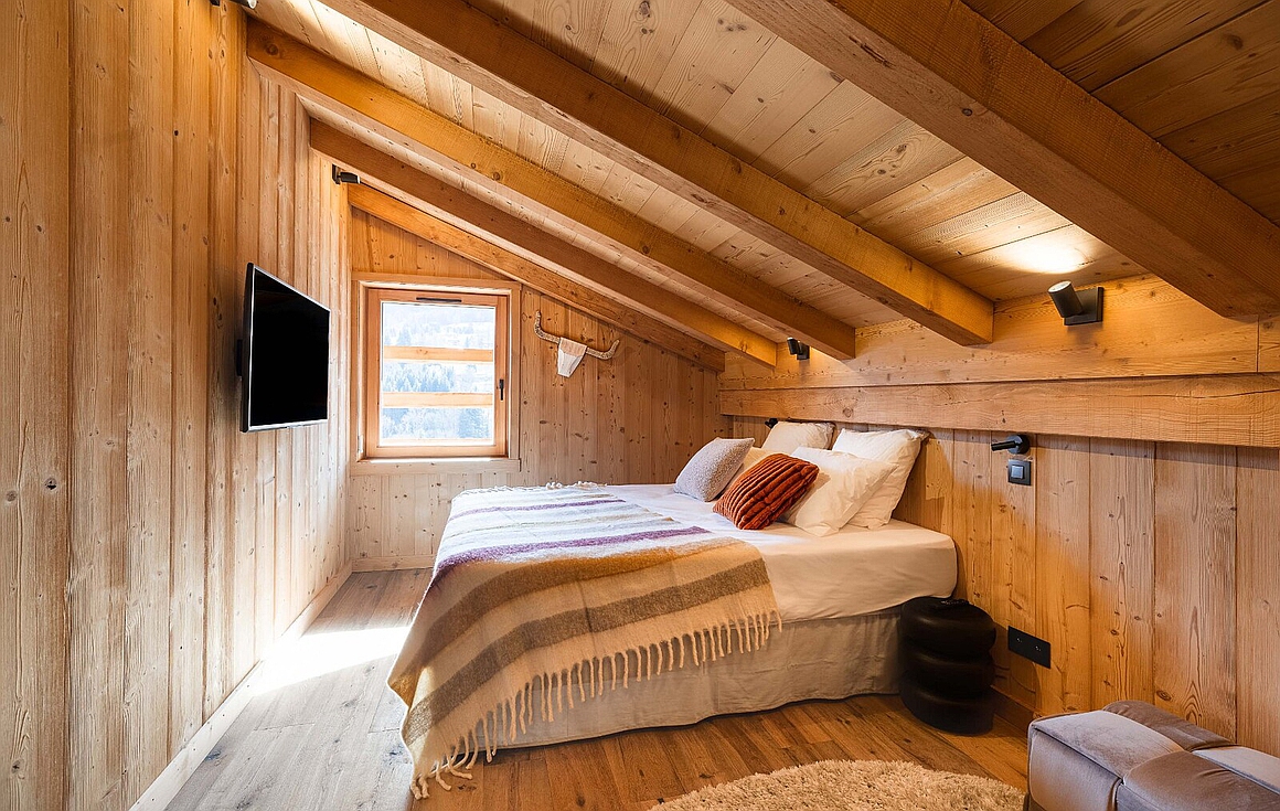 Serene loft bedroom with rustic appeal